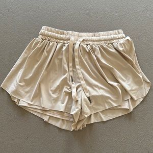 Float cream athletic shorts